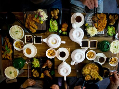view of the table with chinese dishes, glutaminian